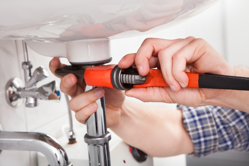 Emergency plumber attending a job in Enfield
